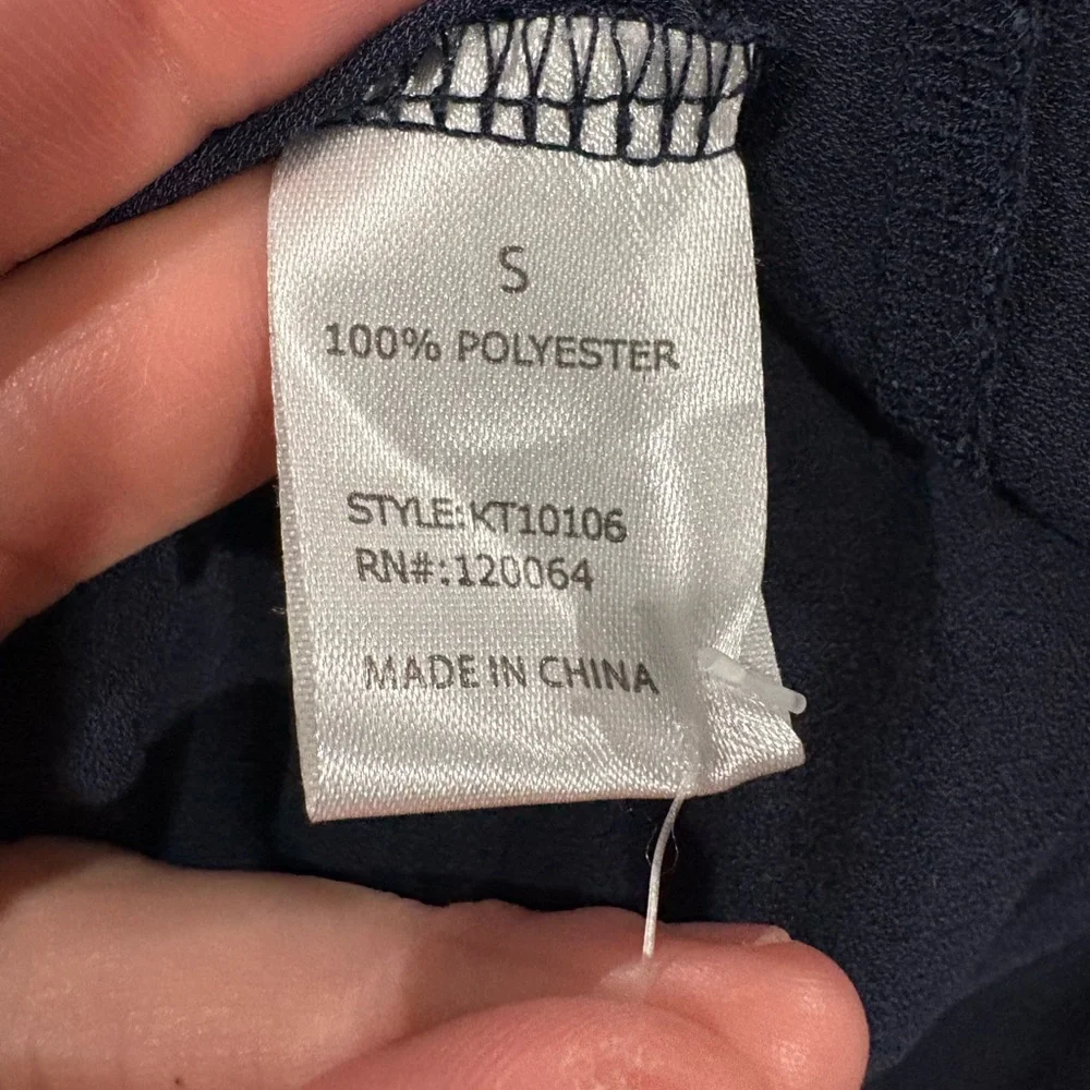 A Classy Chic Boutique Navy Pleated Blouse - Picture 3 of 3